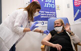 Reina Abitbul, 92, receives a Covid-19 vaccine, at the Shaare Zedek hospital in Jerusalem, on January 3, 2021. (Yonatan Sindel/Flash90)