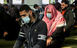 Palestinians wearing face mask attend a prayer at a mosque in Rafah, in the southern Gaza Strip on January 10, 2021. Photo by Abed Rahim Khatib/Flash90