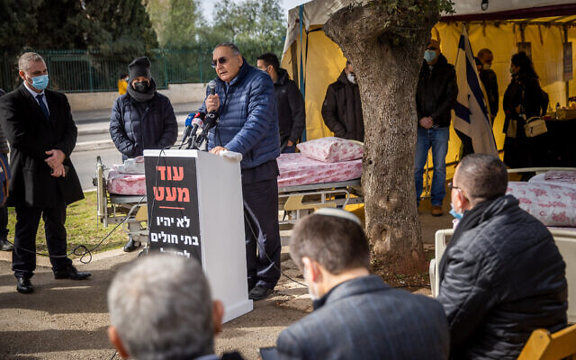 Prof. Zeev Rotstein, CEO of Hadassah Hospital at the protest tent of Hospital directors from Israel outside the Ministry of Finance in Jerusalem demanding equal budgeting from the Ministry of Finance, on January 17, 2021. (Yonatan Sindel/Flash90) Prof. Zeev Rotstein, CEO of Hadassah Hospital at the protest tent of Hospital directors from Israel outside the Ministry of Finance in Jerusalem demanding equal budgeting from the Ministry of Finance, on January 17, 2021. (Yonatan Sindel/Flash90)