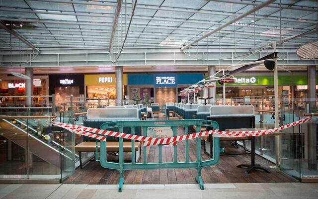 View of the closed-down stores in the Givatayim Mall during a nationwide lockdown, January 18, 2021. (Miriam Alster/Flash90) View of the closed-down stores in the Givatayim Mall during a nationwide lockdown, January 18, 2021. (Miriam Alster/Flash90)