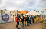 Israelis stand in line for COVID-19 vaccinations in Rehovot, central Israel on January 26, 2021. (Yossi Aloni/Flash90)