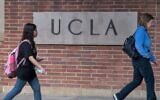Illustrative -- People walk through the campus of the UCLA college in Westwood, California on March 6, 2020 (Photo by MARK RALSTON/AFP via Getty Images via JTA)
