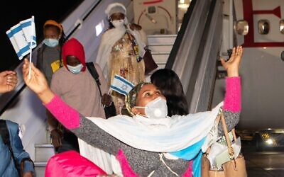 Tedplach Bitao, 28, rejoices as she arrives in  in Israel from Ethiopia on January 22, 2021. (Avi Hayun for Keren Hayesod)