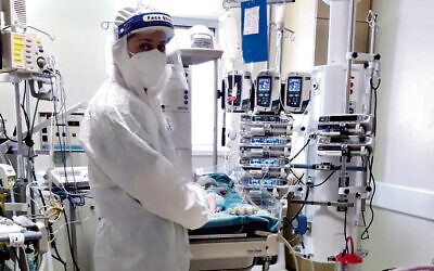 Illustrative: A nurse stands in the children's ICU for coronavirus patients at Jerusalem's Hadassah Hospital Ein Kerem on January 22, 2020. (Courtesy/Hadassah Hospital Ein Kerem)