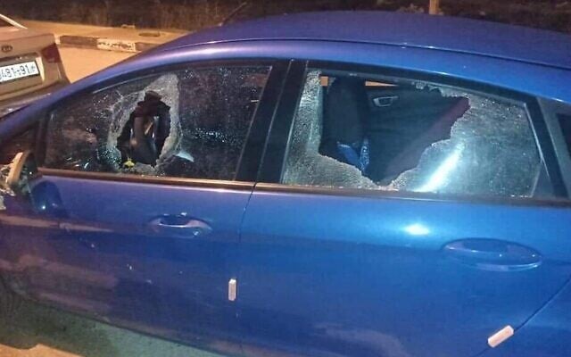 Broken windows are seen on a Palestinian car that was allegedly targeted with rocks by settlers near the Givat Assaf outpost in the West Bank, January 21, 2021. (Yesh Din) Broken windows are seen on a Palestinian car that was allegedly targeted with rocks by settlers near the Givat Assaf outpost in the West Bank, January 21, 2021. (Yesh Din)