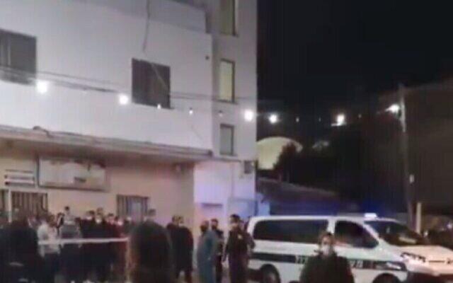 Screen capture from video at the scene of a deadly shooting in the Arab Israeli town of Kafr Qara, January 7, 2021. (Walla news) Screen capture from video at the scene of a deadly shooting in the Arab Israeli town of Kafr Qara, January 7, 2021. (Walla news)