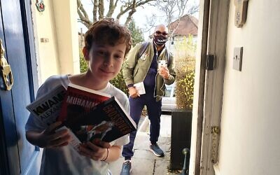 Poet and author Kwame Alexander surprises bar mitzvah boy Mossy Simonson at his home in London, January 17, 2021. (Raymond Simonson)