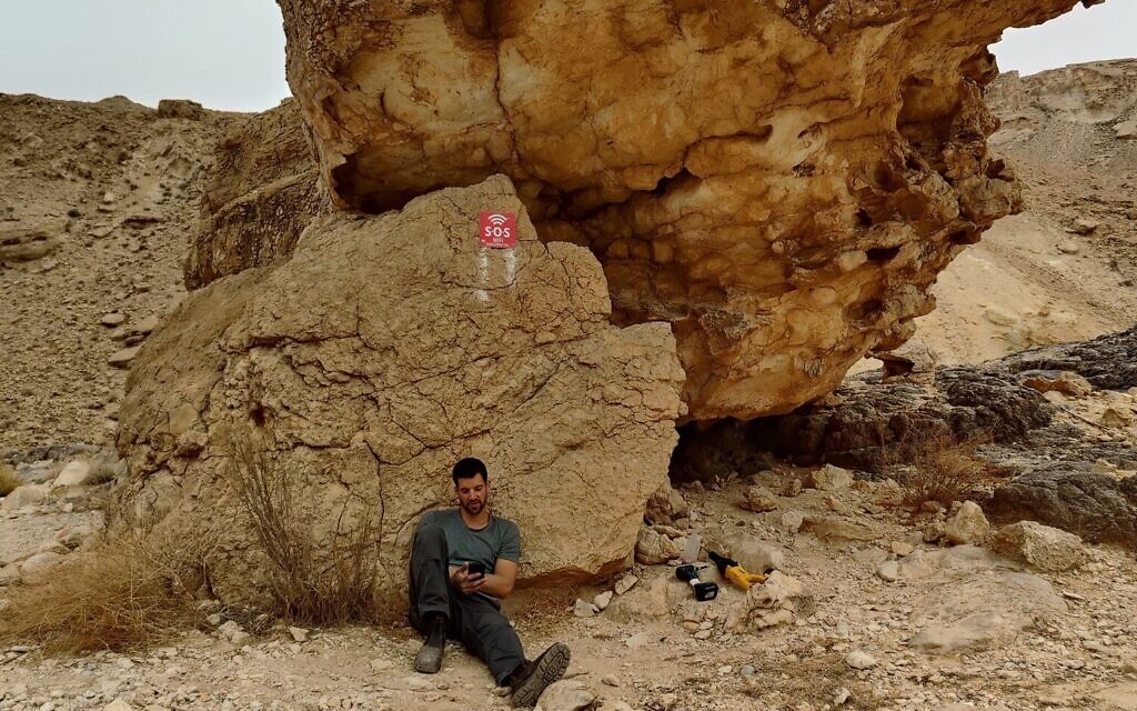 A worker installing an SOS WiFi router in the Hawwa stream hiking trail in southern Israel. (Courtesy) A worker installing an SOS WiFi router in the Hawwa stream hiking trail in southern Israel. (Courtesy)