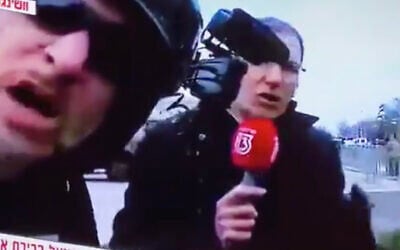 A man yells anti-Semitic slurs at Gil Tamari, the Washington correspondent for Israel's Channel 13 news, during the storming of the US Capitol by Trump supporters on January 7, 2021. (Screen capture: Twitter)