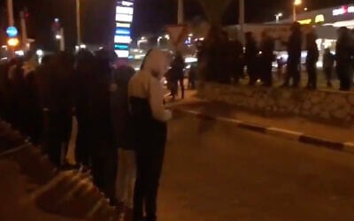 Umm al-Fahm residents hold prayers on Route 65 to protest the shooting death of Muhammed Nasser Aghbariah in the northern Arab Israeli city, January 22, 2021.