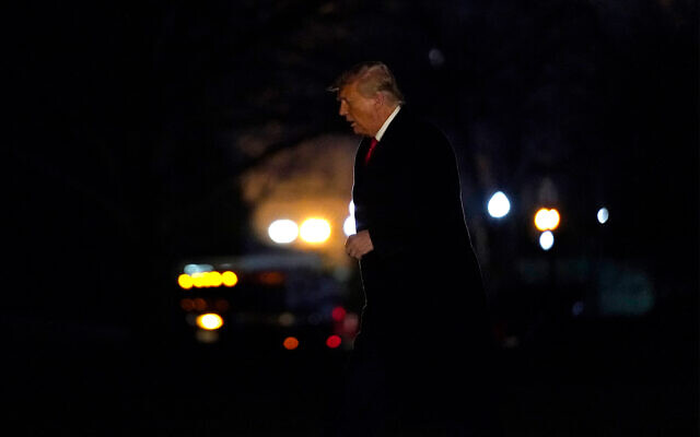 US President Donald Trump arrives on the South Lawn of the White House in Washington after a trip to Texas, January 12, 2021. (AP Photo/Gerald Herbert) US President Donald Trump arrives on the South Lawn of the White House in Washington after a trip to Texas, January 12, 2021. (AP Photo/Gerald Herbert)