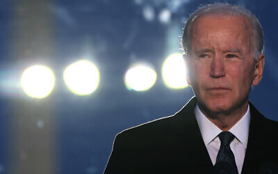 US President-elect Joe Biden delivers brief remarks during a memorial service to honor the 400,000 American victims of the coronavirus pandemic at the Reflecting Pool in front of the Lincoln Memorial in Washington, DC, January 19, 2021. (Chip Somodevilla/Getty Images/AFP)