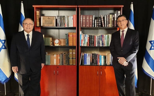 Dani Dayan, left, and New Hope party leader Gideon Sa'ar, right, in a photo released by New Hope on January 13, 2021. (Courtesy/New Hope campaign) Dani Dayan, left, and New Hope party leader Gideon Sa'ar, right, in a photo released by New Hope on January 13, 2021. (Courtesy/New Hope campaign)