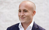 Max Rose poses for a portrait outside his office in Staten Island, New York, October 8, 2020. (AP Photo/Kathy Willens)