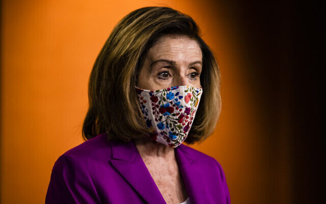 Speaker of the US House Nancy Pelosi calls for the removal of President Donald Trump from office either by invocation of the 25th Amendment or impeachment at the US Capitol in Washington, DC, January 7, 2021. (Samuel Corum/Getty Images/AFP) Speaker of the US House Nancy Pelosi calls for the removal of President Donald Trump from office either by invocation of the 25th Amendment or impeachment at the US Capitol in Washington, DC, January 7, 2021. (Samuel Corum/Getty Images/AFP)