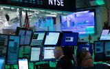 Illustrative: Traders at the New York Stock Exchange, March 17, 2020. (AP Photo/Mark Lennihan)