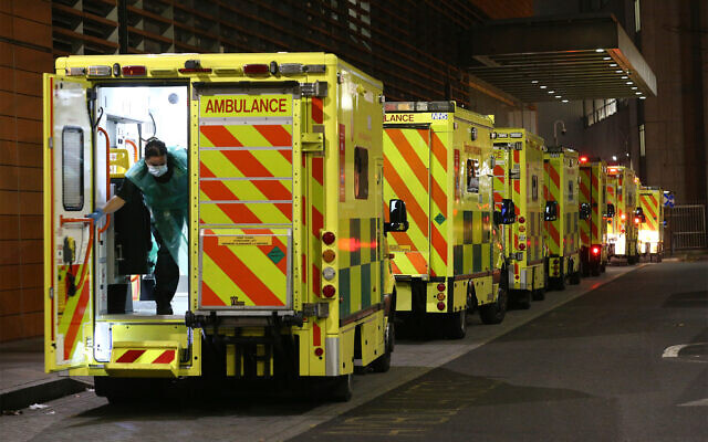Illustrative: A row of ambulances parked outside the Royal London Hospital in London, December 29, 2020. (Yui Mok/PA via AP) Illustrative: A row of ambulances parked outside the Royal London Hospital in London, December 29, 2020. (Yui Mok/PA via AP)