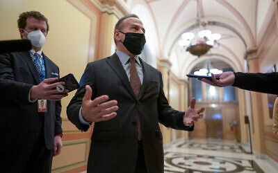 US House Representative David Cicilline, a Rhode Island Democrat, talks to reporters outside the House chamber after a resolution calling for the removal of President Donald Trump from office was blocked by Republicans, at the Capitol in Washington, January 11, 2021. (AP Photo/J. Scott Applewhite)