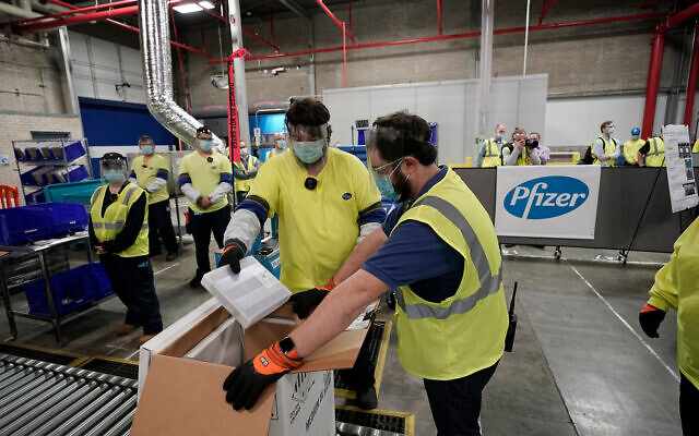 Boxes containing the Pfizer-BioNTech COVID-19 vaccine are prepared to be shipped at the Pfizer Global Supply Kalamazoo manufacturing plant in Portage, Michigan, Dec. 13, 2020. (AP Photo/Morry Gash, Pool, File) Boxes containing the Pfizer-BioNTech COVID-19 vaccine are prepared to be shipped at the Pfizer Global Supply Kalamazoo manufacturing plant in Portage, Michigan, Dec. 13, 2020. (AP Photo/Morry Gash, Pool, File)