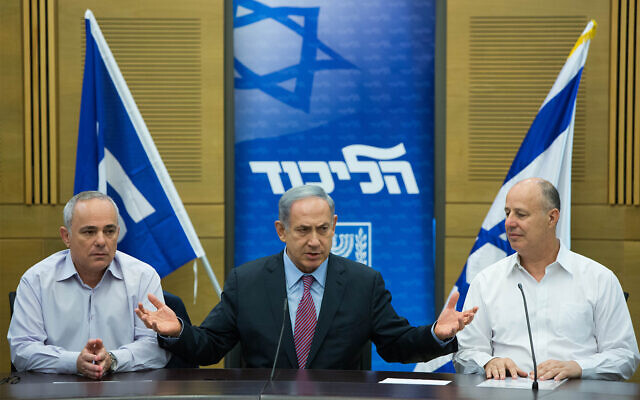 Prime Minister Benjamin Netanyahu, center, seen with Likud's Tzachi Hanegbi, right, and Yuval Steinitz, left during a Likud faction meeting at the Knesset, July 27, 2015. (Yonatan Sindel/Flash90) Prime Minister Benjamin Netanyahu, center, seen with Likud's Tzachi Hanegbi, right, and Yuval Steinitz, left during a Likud faction meeting at the Knesset, July 27, 2015. (Yonatan Sindel/Flash90)