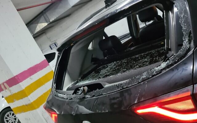 A police car after an attack by an ultra-Orthodox mob in the city of Bnei Brak, January 21, 2021. (Israel Police) A police car after an attack by an ultra-Orthodox mob in the city of Bnei Brak, January 21, 2021. (Israel Police)