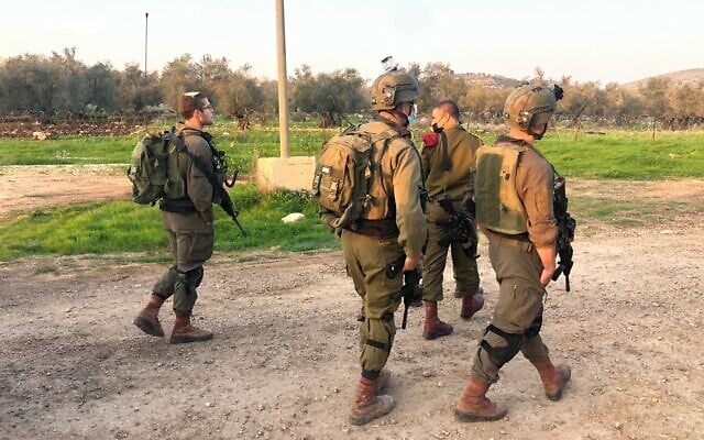 A photo released by the Israel Defense Forces shows soldiers in the West Bank following an attempted ramming and stabbing attack near the Palestinian town of Yabad on January 9, 2021. (Israel Defense Forces) A photo released by the Israel Defense Forces shows soldiers in the West Bank following an attempted ramming and stabbing attack near the Palestinian town of Yabad on January 9, 2021. (Israel Defense Forces)