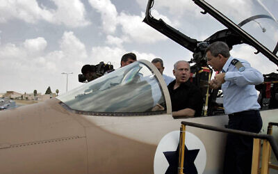 Prime Minister Benjamin Netanyahu and sits in the cockpit of F-15i fighter jet, August 11, 2009, during a visit to the Hatzerim air base in southern Israel. (Edi Israel/Flash90) 



 *** Local Caption *** ?????? ??????
???? ?????
????? ????
??????
??????
??? ??????
??? ????? ?????