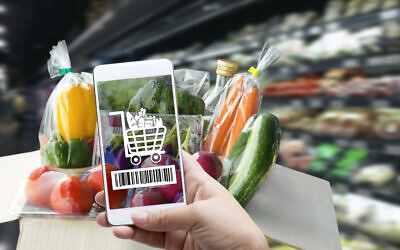 Israel Discount Bank Ltd. and the nation's largest supermarket chain Shufersal are setting up a joint venture to offer a digital banking services that aims to compete with the traditional banking system (ARISA THEPBANCHORNCHAI; iStock by Getty Images)