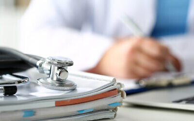 Illustrative image of a hospital intern, a physician or a medical professional (megaflopp; iStock by Getty Images)