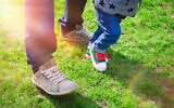 Illustrative image of a baby's first steps (NelliSyr; iStock by Getty Images)