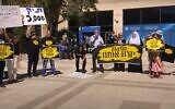 Protesters rally against plans for the Kesem power station. 'This gas will kill us,' read the signs in yellow (YouTube screenshot)