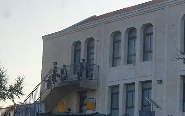 Screen grab from a video apparently showing students entering a yeshiva in Beitar Illit despite the government lockdown (Channel 12 news) Screen grab from a video apparently showing students entering a yeshiva in Beitar Illit despite the government lockdown (Channel 12 news)