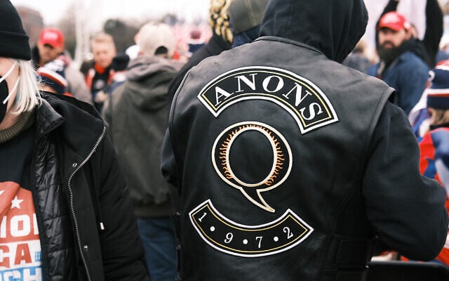 Qanon 1972 jacket (Spencer Platt/Getty Images via JTA) Qanon 1972 jacket (Spencer Platt/Getty Images via JTA)