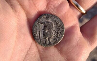 Coin with the Syrian god MEN (the moon god) surrounded by the legend 'of the people of Geva
Phillipi' civic year 217 (158–159 CE) (Israel Antiquities Authority)