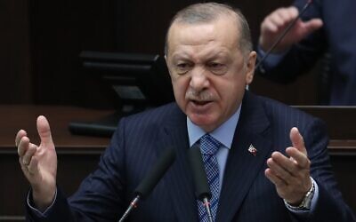 Turkish President and leader of the Justice and Development (AK) Party Recep Tayyip Erdogan speaks during a parliamentary group meeting on January 27, 2021, at the Grand National Assembly of Turkey (GNAT) in Ankara. (Adem ALTAN / AFP)
