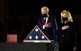 US President Joe Biden and First Lady Jill Biden pay their respects to late US Capitol Police officer Brian Sicknick, as he lies in honor in the Capitol Rotunda in Washington, DC February 2, 2021. (Erin Cchaff / POOL / AFP)