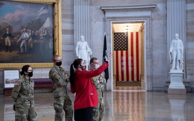 Members of the National Guard get a tour of the Rotunda on Capitol Hill before the beginning of the first day of former US President Donald Trump's trial before the Senate February 9, 2021, in Washington, DC. (Brendan Smialowski / AFP) Members of the National Guard get a tour of the Rotunda on Capitol Hill before the beginning of the first day of former US President Donald Trump's trial before the Senate February 9, 2021, in Washington, DC. (Brendan Smialowski / AFP)