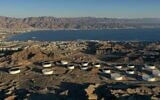 This aerial photograph, taken on February 10, 2021, shows the oil storage containers of the Eilat Ashkelon Pipeline Company (EAPC) in the mountains near Israel's Red Sea port city of Eilat. (MENAHEM KAHANA/AFP)
