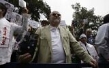 Anis Naccache, a Lebanese pro-Palestinian former terrorist notorious for his role in the 1975 OPEC hostage-taking in Vienna and the attempted assassination near Paris of Iran's former premier, during a demonstration outside the French embassy in the capital Beirut, April 30, 2010. (Anwar AMRO / AFP)