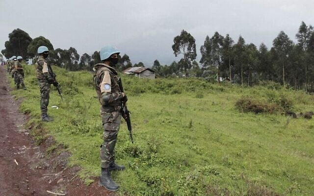 Moroccan soldiers of the MONUSCO (United Nations Organization Stabilization Mission in the DR Congo) patrol the road in the Kibumba area in the Virunga National Park, on February 22, 2021, where Italy's ambassador to the Democratic Republic of Congo was killed earlier when a UN convoy came under attack. (Alexis Hughet/AFP) Moroccan soldiers of the MONUSCO (United Nations Organization Stabilization Mission in the DR Congo) patrol the road in the Kibumba area in the Virunga National Park, on February 22, 2021, where Italy's ambassador to the Democratic Republic of Congo was killed earlier when a UN convoy came under attack. (Alexis Hughet/AFP)