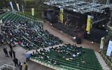 Tel Aviv kicks off the return of live performances with a concert by singer Nurit Galron for the city’s older residents in Ganei Yehoshua park, February 24, 2021. (JACK GUEZ / AFP)