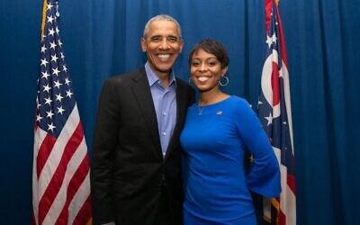 Shontel Brown poses with former US President Barack Obama in an undated image from her congressional campaign website. (Courtesy)