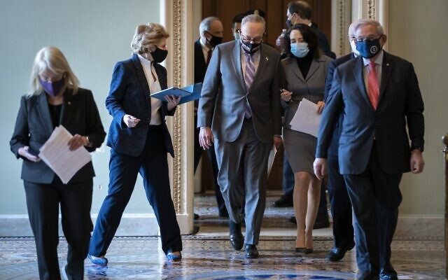 (L-R) Senator Patty Murray, Senator Debbie Stabenow, Senate Majority Leader Chuck Schumer, Senator Maria Cantwell and Senator Robert Menendez walk to a news conference on the first day of former President Donald Trump's second impeachment trial at the US Capitol on February 9, 2021 in Washington, DC. (Drew Angerer/Getty Images/AFP) (L-R) Senator Patty Murray, Senator Debbie Stabenow, Senate Majority Leader Chuck Schumer, Senator Maria Cantwell and Senator Robert Menendez walk to a news conference on the first day of former President Donald Trump's second impeachment trial at the US Capitol on February 9, 2021 in Washington, DC. (Drew Angerer/Getty Images/AFP)