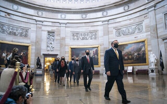 House impeachment managers, lead by Congressman Jamie Raskin, Lead Manager, proceed through the Capitol Rotunda from the House side of the U.S. Capitol to the U.S. Senate chamber as the second impeachment trial of former U.S. President Donald Trump begins February 9, 2021 in Washington, DC. (Sarah Silbiger/Getty Images/AFP) House impeachment managers, lead by Congressman Jamie Raskin, Lead Manager, proceed through the Capitol Rotunda from the House side of the U.S. Capitol to the U.S. Senate chamber as the second impeachment trial of former U.S. President Donald Trump begins February 9, 2021 in Washington, DC. (Sarah Silbiger/Getty Images/AFP)