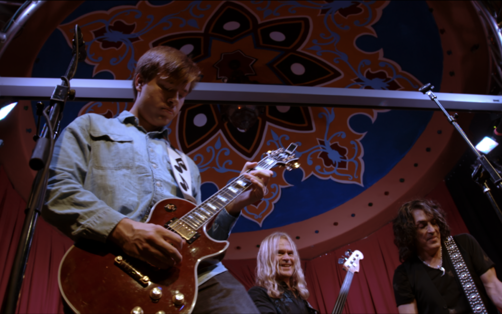 Guitarist Blake Meinhart plays with Tony Franklin and Paul Stanley from KISS at the House of Blues in Las Vegas, Nevada, on October 7, 2018. (Courtesy Rock N' Roll Fantasy Camp)