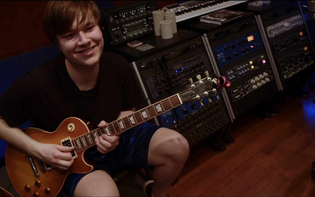 Rock ‘N’ Roll Fantasy Camp helped transform camper Blake Meinhardt. Blake was diagnosed with autism at age four, and his father brought him to Rock Camp to help build his son’s confidence. Today, Blake attends college at Kent State University, in Kent, Ohio. (Courtesy Rock N' Roll Fantasy Camp)