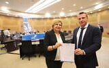 Yesh Atid, with MK Orna Barbivai at left, presents its candidates' list for the March 23, 2021 election to the Central Elections Committee, in the Knesset, February 3, 2021 (GPO)