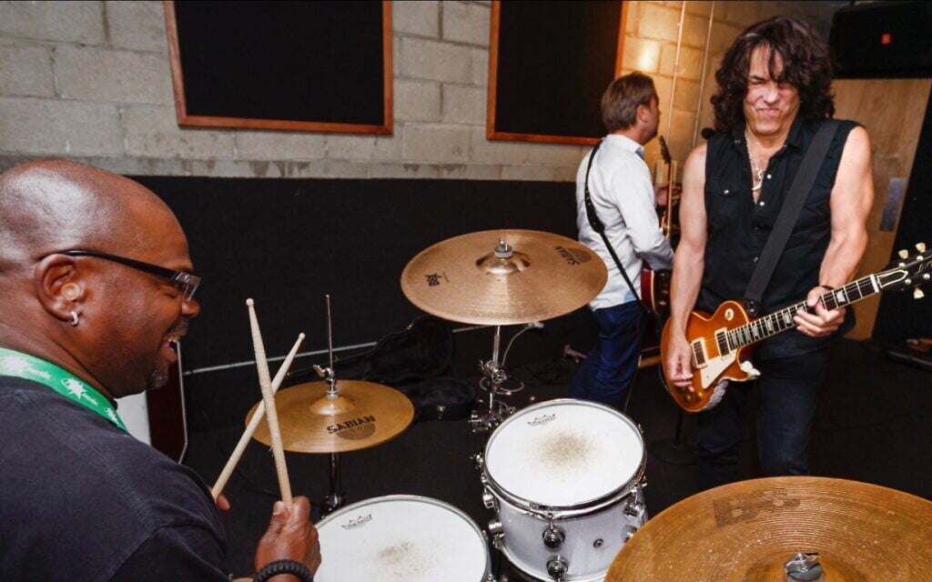 On drums, Scott 'Pistol' Crocket, a rock camper, playing with Paul Stanley, KISS co-lead singer and guitarist at Rock ‘N’ Roll Fantasy Camp in North Hollywood, CA on June 16, 2016. (Courtesy Rock N' Roll Fantasy Camp)