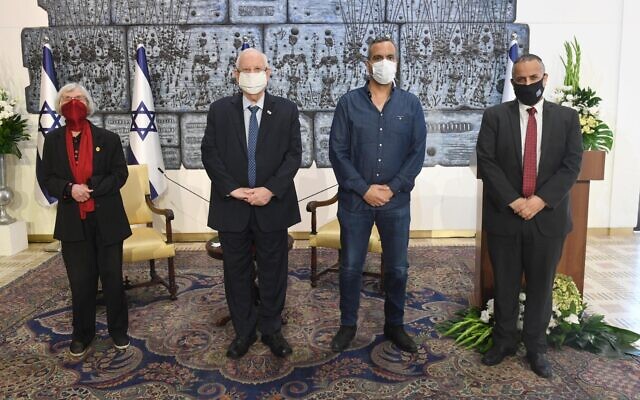 President Reuven Rivlin (second left) hosting the launch of the Israeli Press Institute at the President's Residence in Jerusalem, February 7, 2021. (Mark Neyman/GPO) President Reuven Rivlin (second left) hosting the launch of the Israeli Press Institute at the President's Residence in Jerusalem, February 7, 2021. (Mark Neyman/GPO)