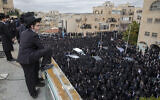 Thousands of ultra-Orthodox Jews participate in funeral for prominent rabbi Meshulam Dovid Soloveitchik, in Jerusalem, January 31, 2021. (AP/Ariel Schalit)